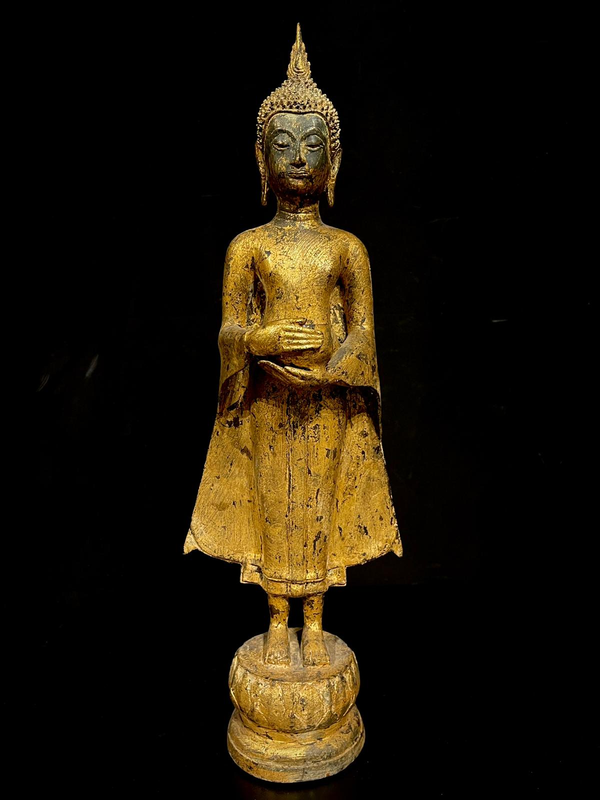 Bronze standing Buddha holding an alm bowl- Ms16904